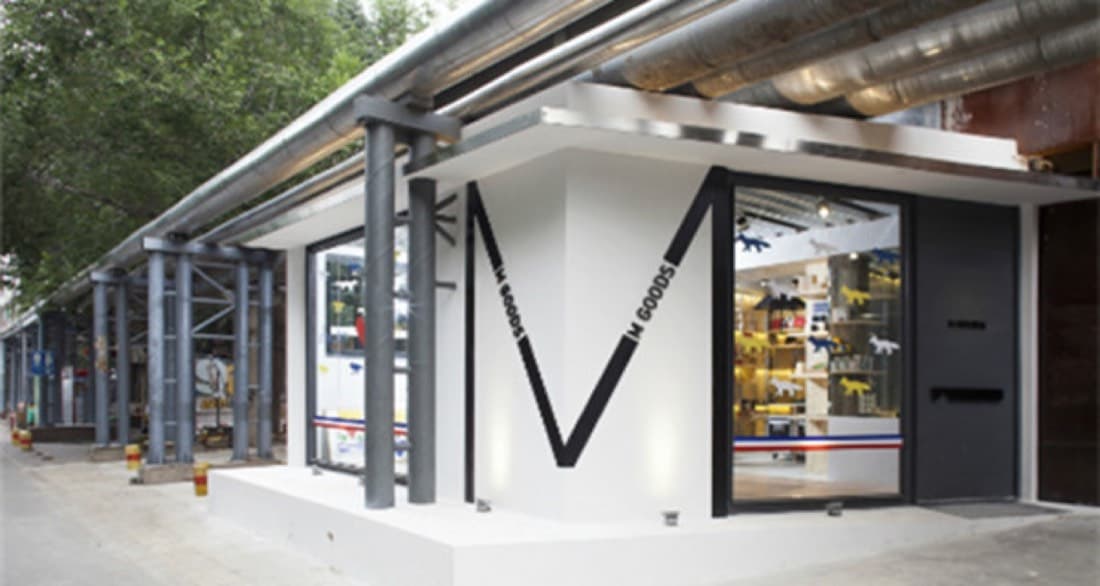 The M Woods orbit is part of 798's younger, design-aware museum-and-shop ecosystem.