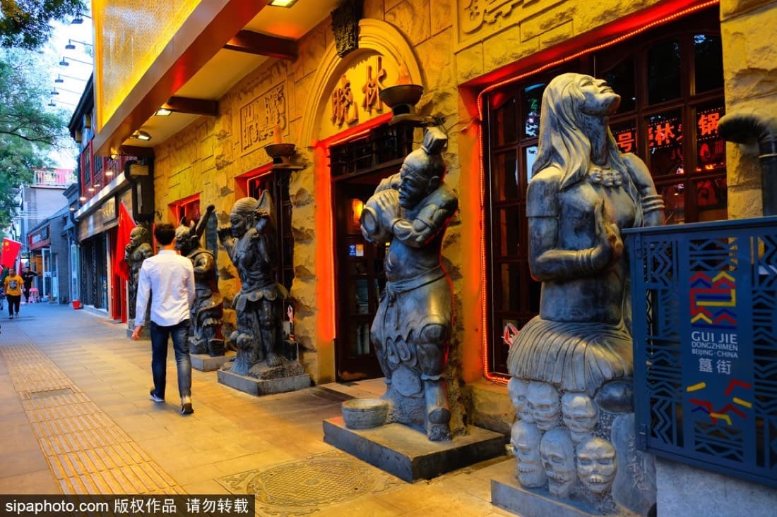 Lanterns and courtyard-style restaurants are part of why Guijie feels more theatrical than a normal dinner street.