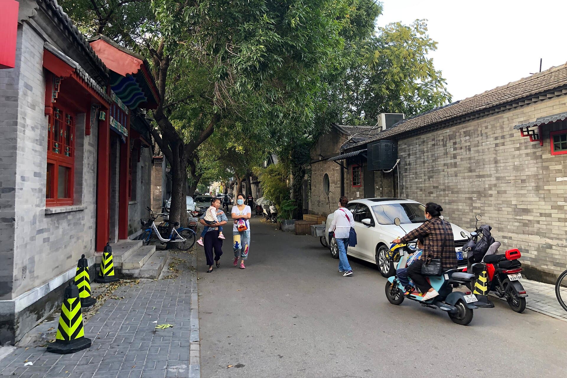 Beiluoguxiang gives visitors the central hutong mood without making every minute feel like a crowd funnel.