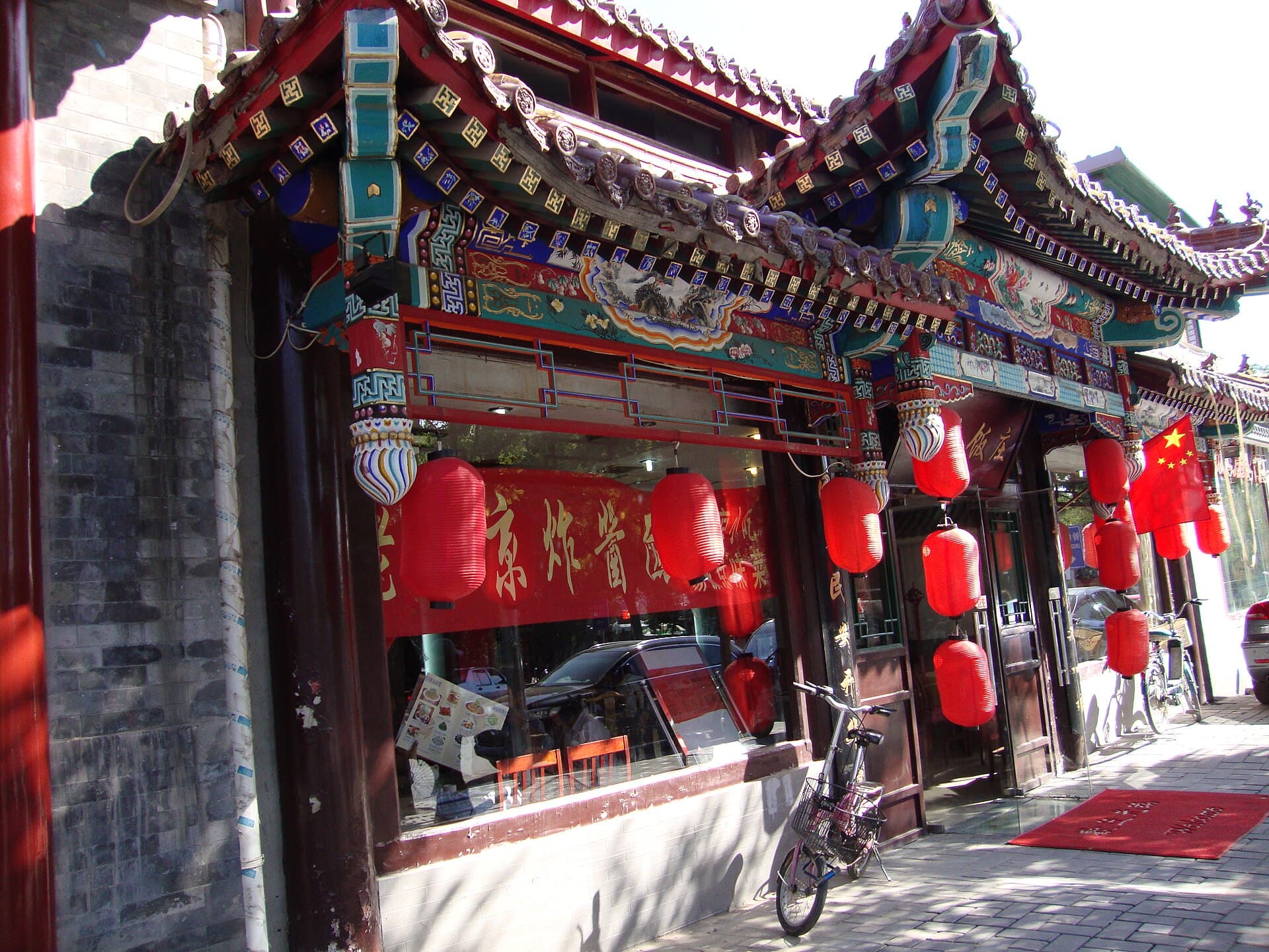 For hutongs, the best moments are often ordinary: grey brick, doorways, bikes, and a city moving at walking speed.