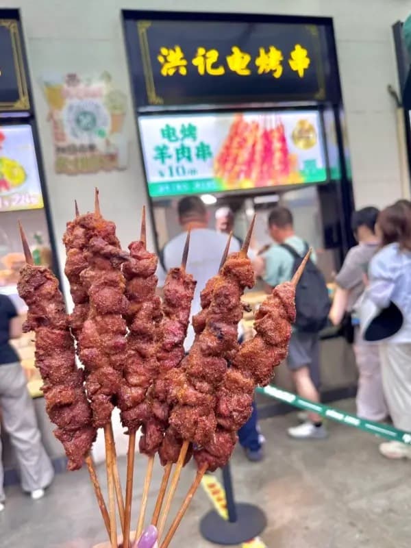 Lamb is the emotional center of many Niujie meals, from skewers to copper-pot shuanrou.