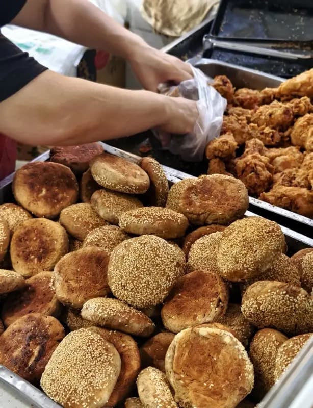 A good shaobing is flaky, savory, sesame-rich, and far more memorable than another packaged snack.
