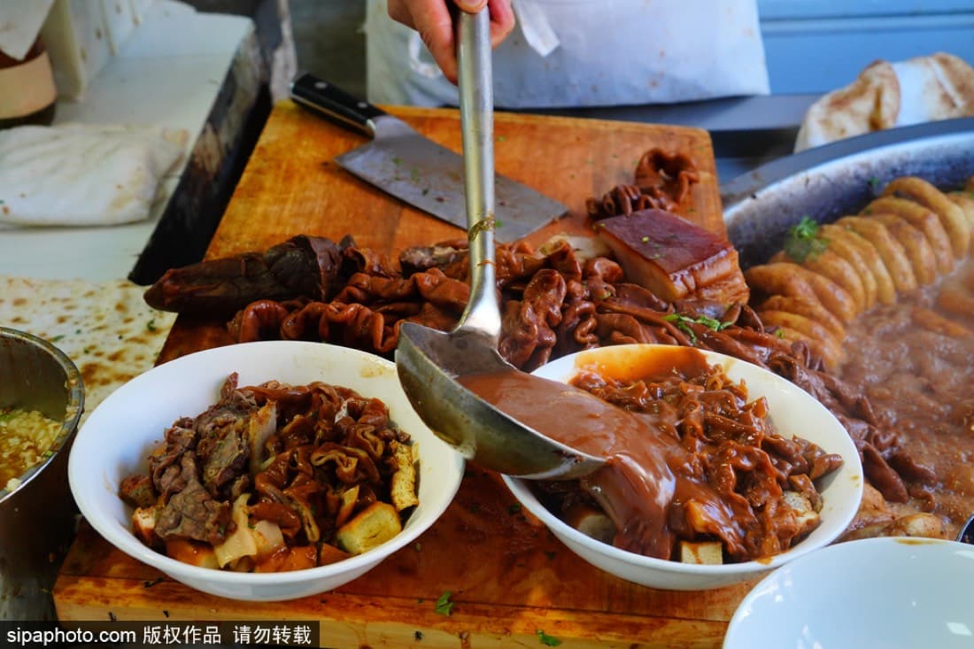 Old Beijing breakfast shops are fast, crowded, and practical: the charm is in the morning rhythm as much as the flavor.
