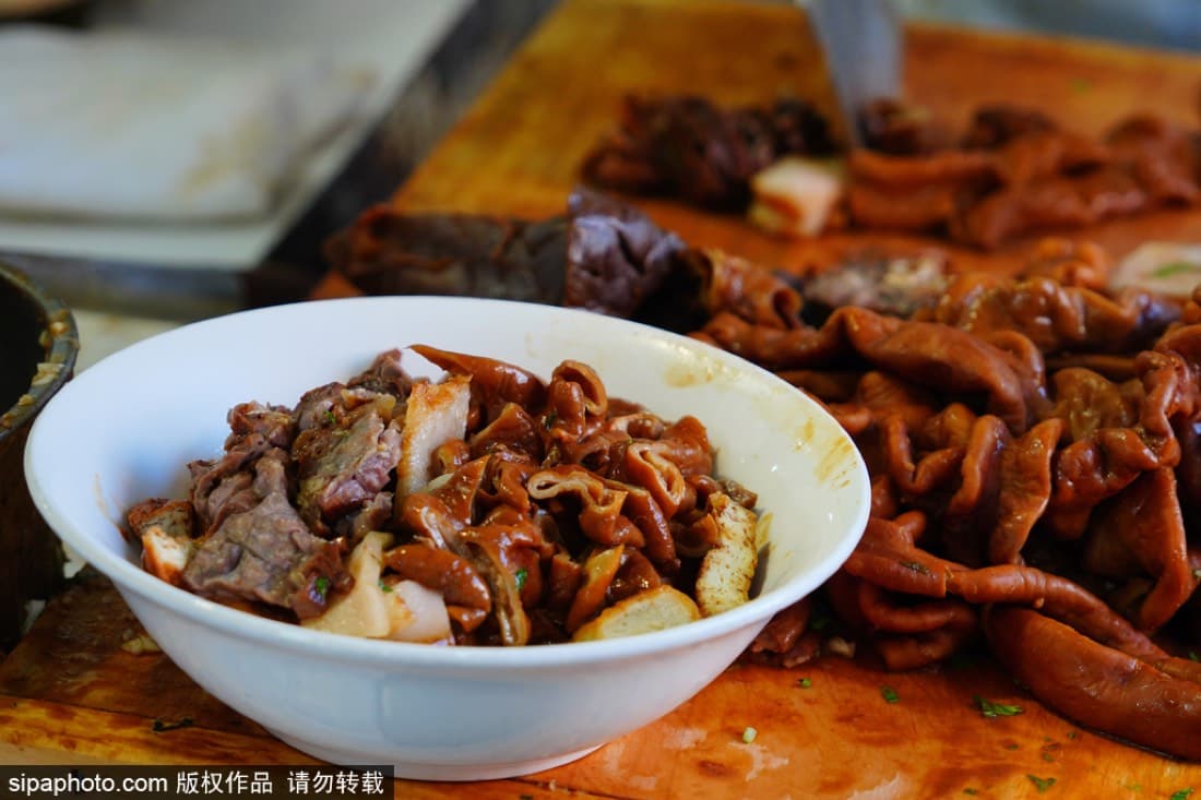 Luzhu is hearty, offal-forward, and very Beijing. It is a dish to approach with curiosity and a clear appetite.
