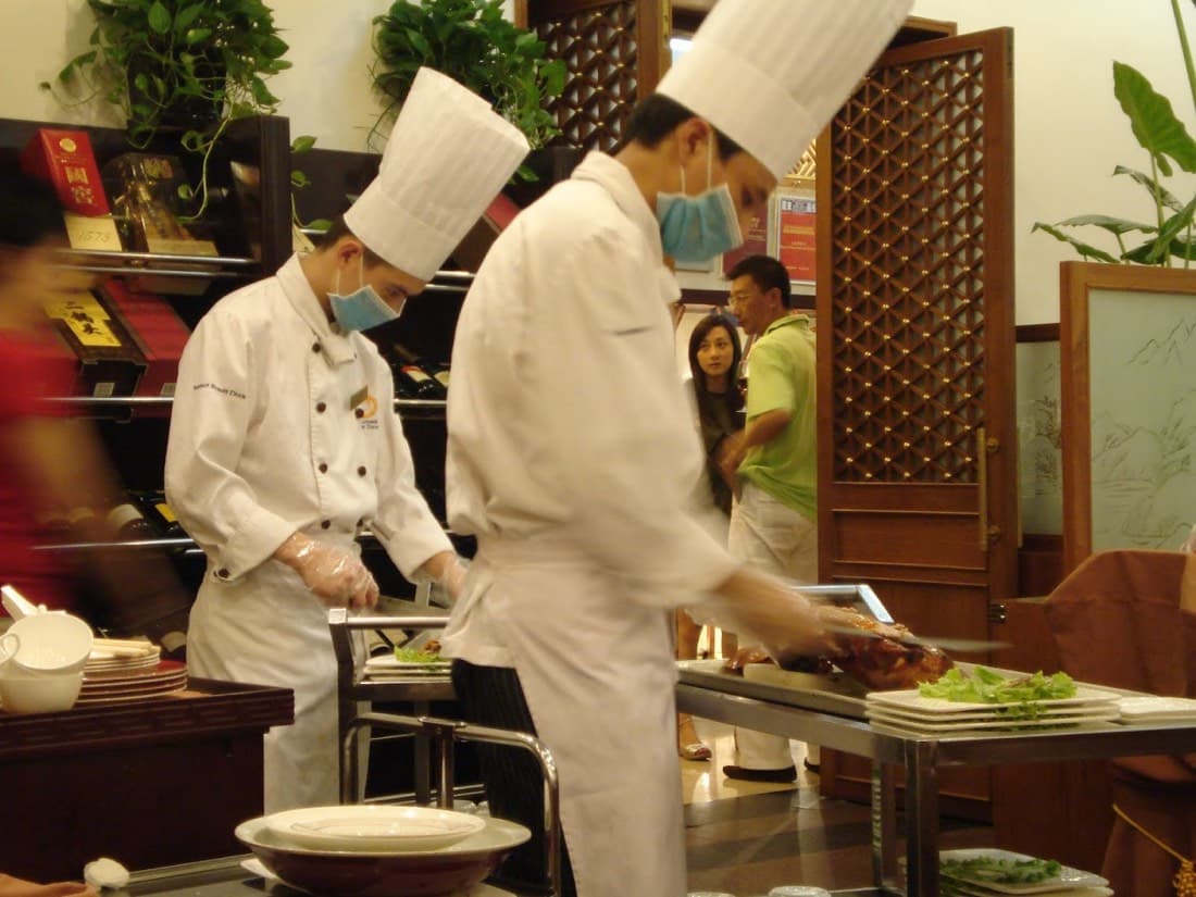A duck dinner near Qianmen pairs well with a central-axis walk, but convenience usually means crowds.