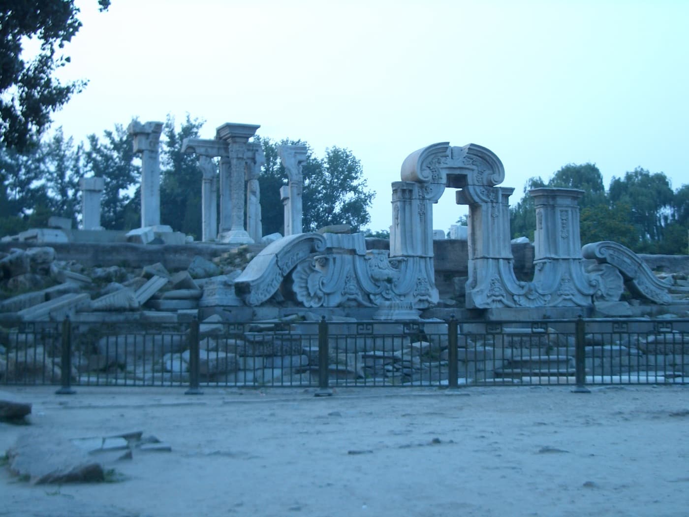 Yuanmingyuan's fragments are quieter than the Summer Palace, but they stay with many visitors longer.