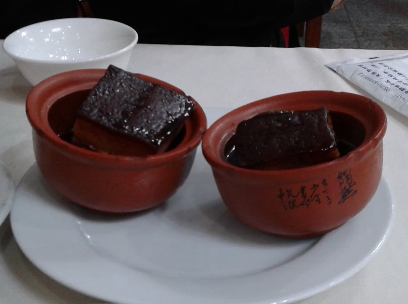 A good Dongpo pork order gives you Hangzhou history without asking the whole table to gamble on a divisive flavor.