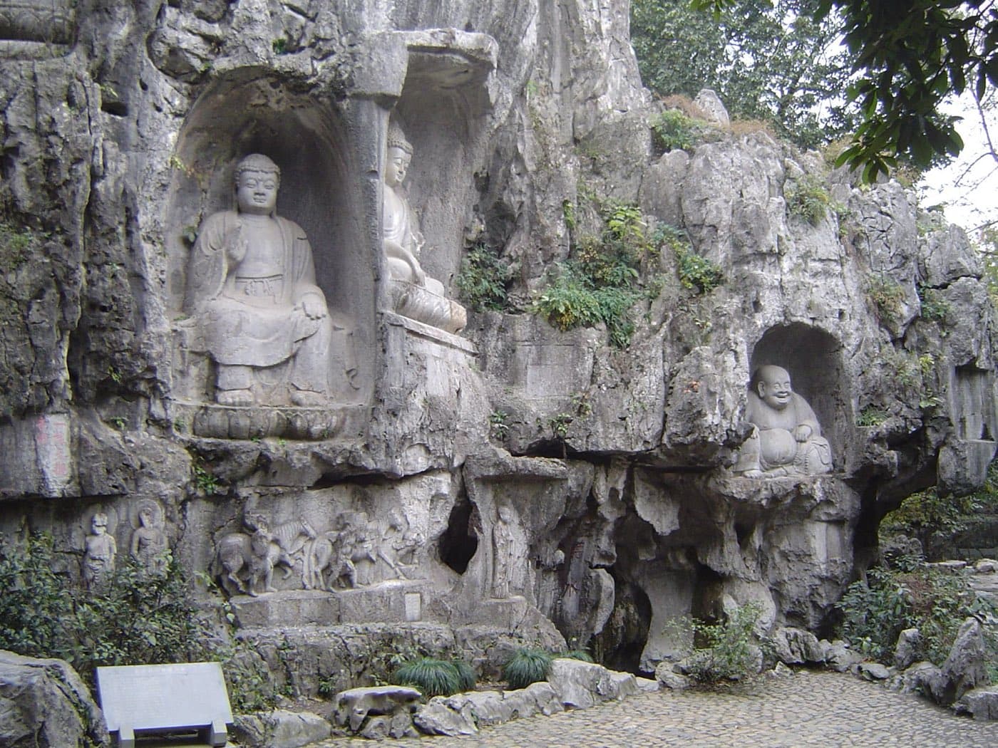 Early arrival gives you more room to notice the stone, trees, halls, and incense before the valley fills.