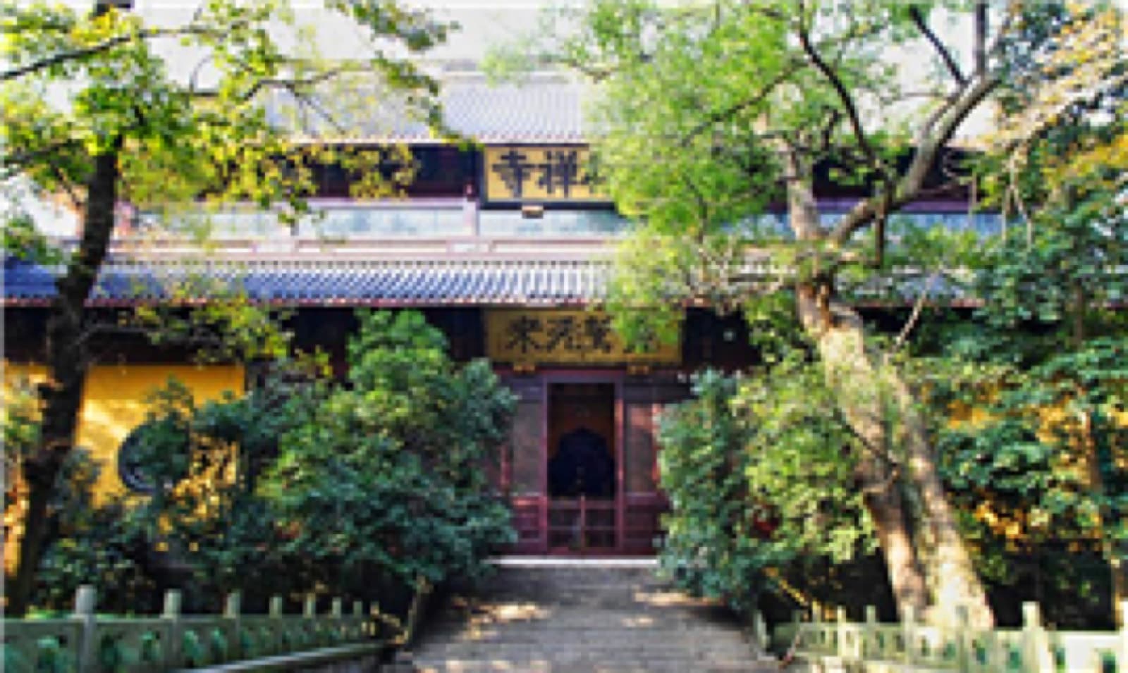 Lingyin's appeal is the combination of temple architecture, old trees, hills, and active Buddhist practice.
