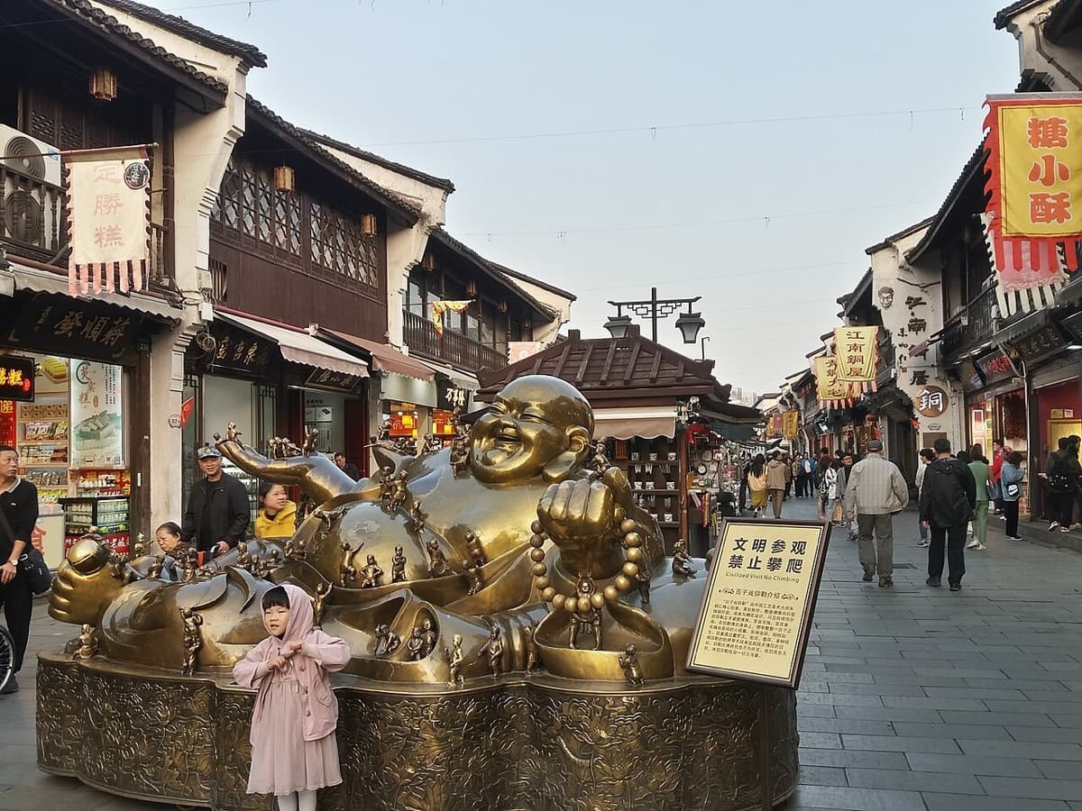 Hefang Street is good for evening atmosphere, snacks, and old-street visuals, as long as you accept the tourist polish.
