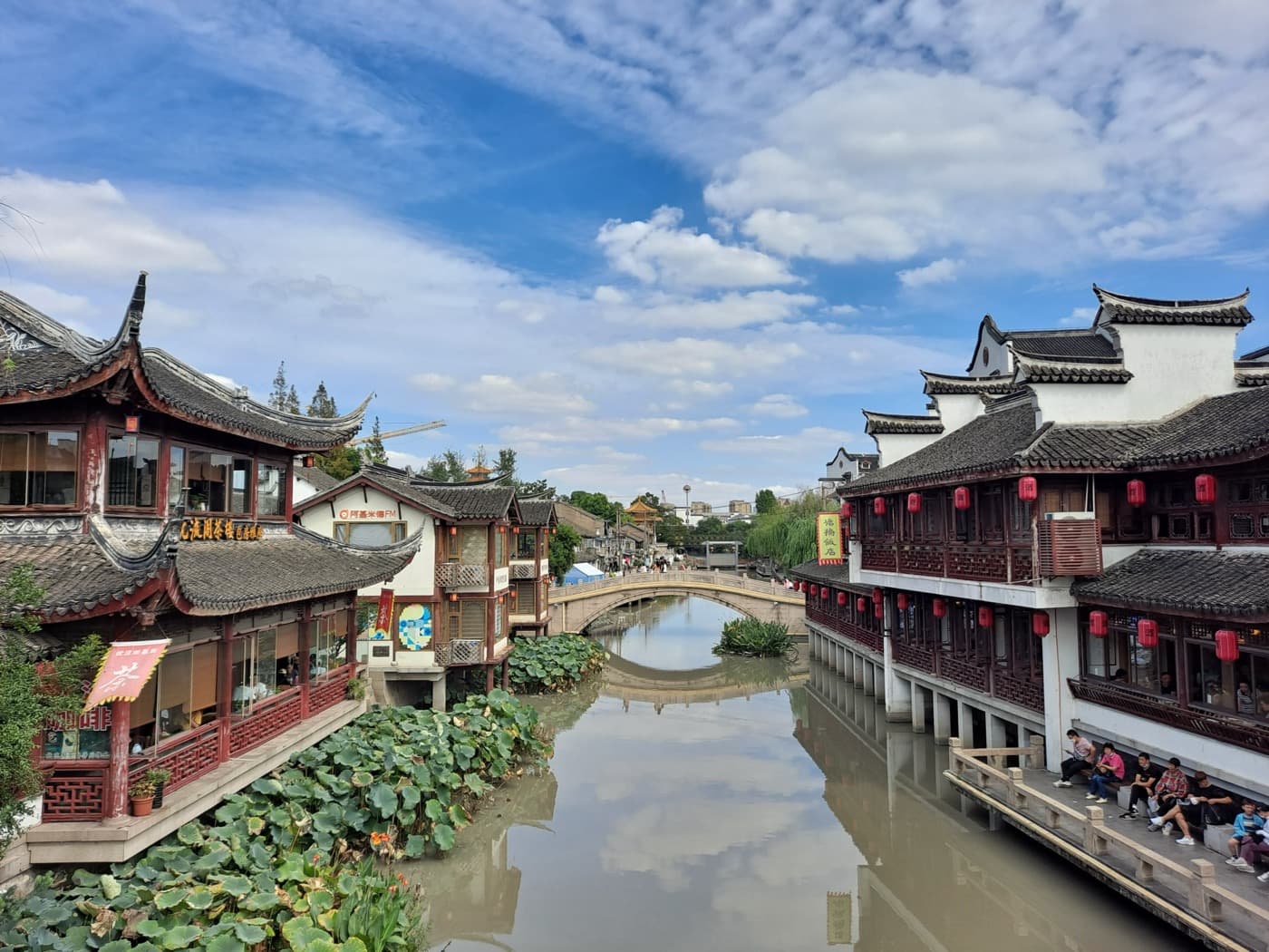 Qibao is the easiest ancient-town add-on when you want canals and snacks without a full day trip.