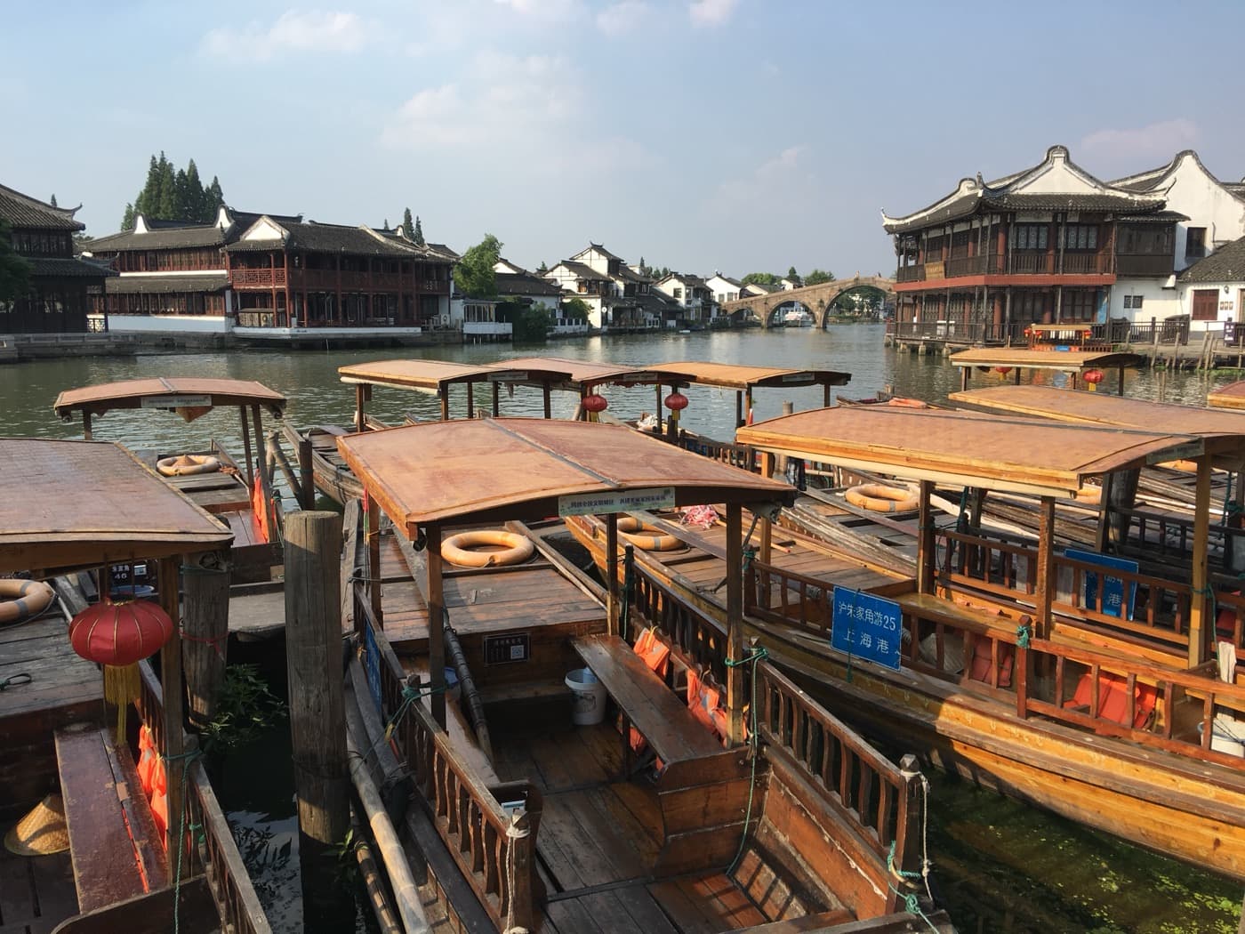Zhujiajiao is the best choice when you want canals, stone bridges, and a full water-town rhythm.