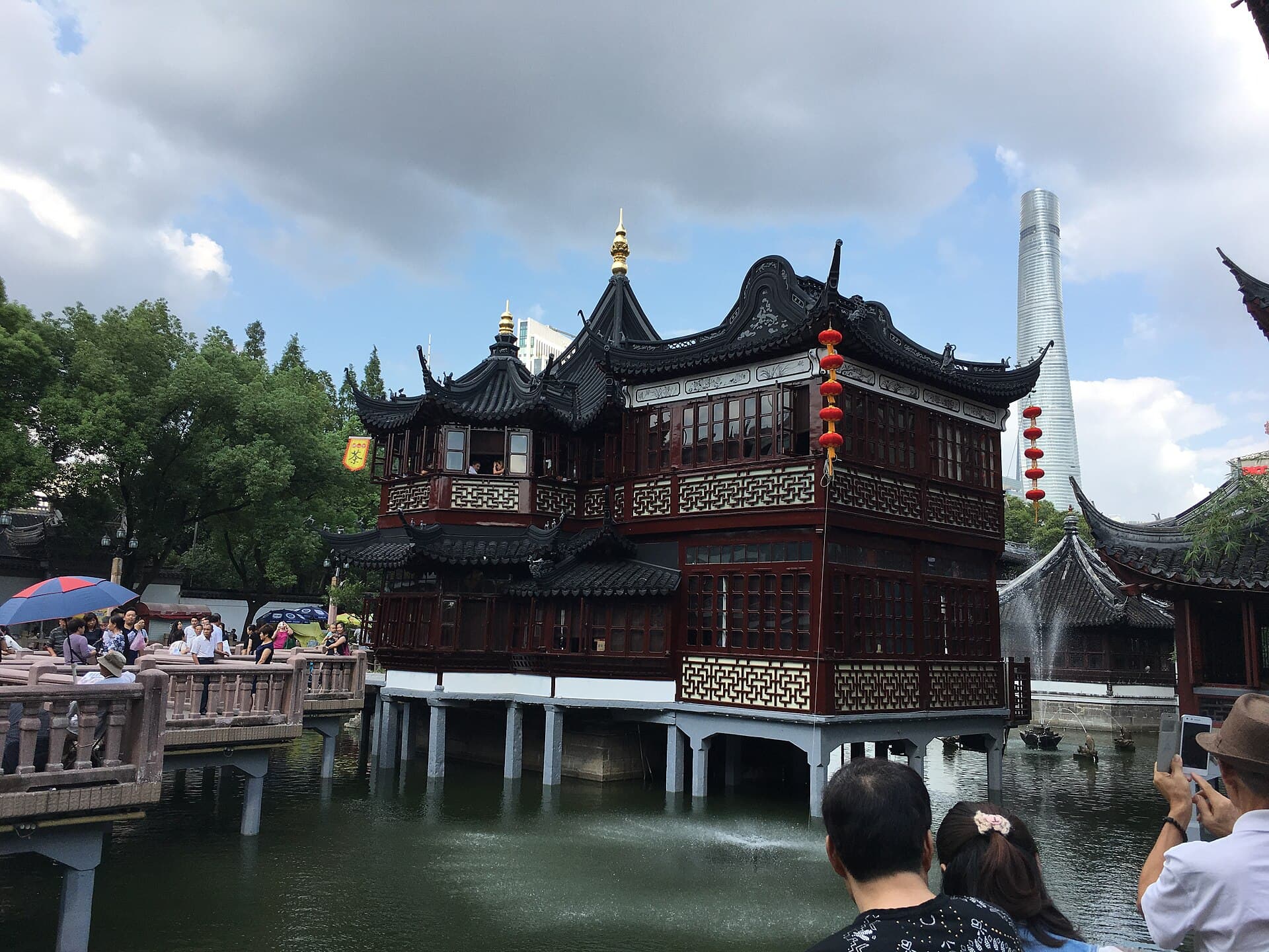 Huxinting Teahouse and the surrounding pond show how old-town Shanghai sits beside the modern skyline.