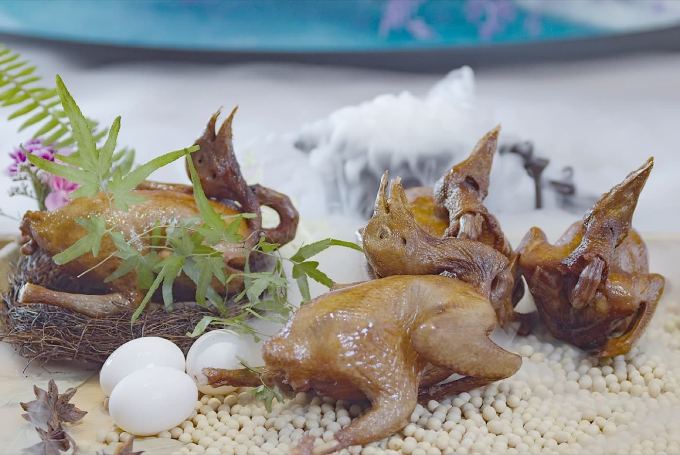 The appeal is texture: crisp skin, compact meat, and a dish that wants to be eaten immediately.