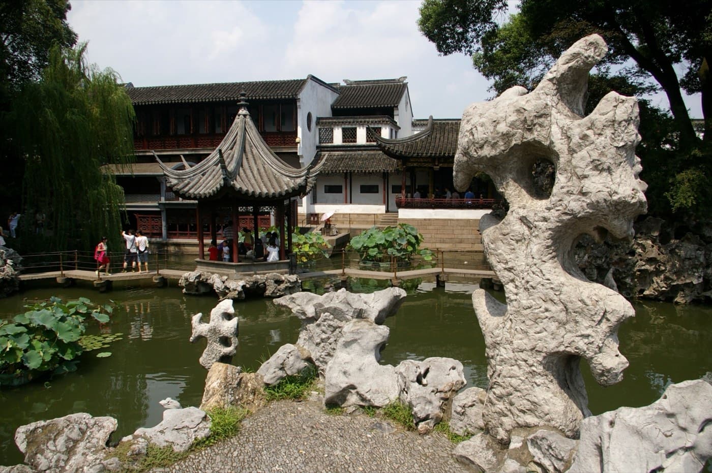 Taihu rocks make the garden feel mountainous without needing an actual mountain.