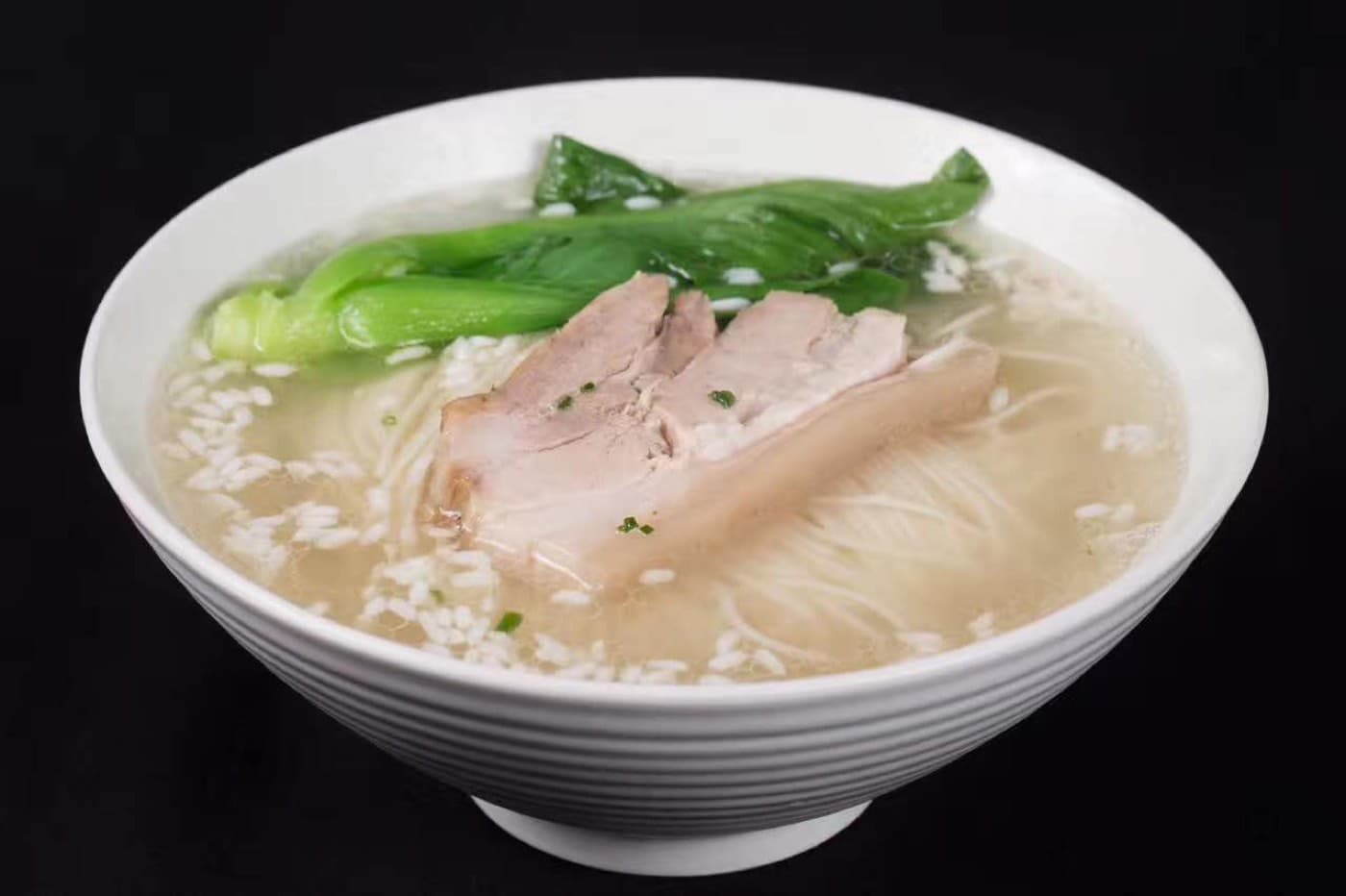The neat bundle of thin noodles is part of the Suzhou noodle aesthetic.