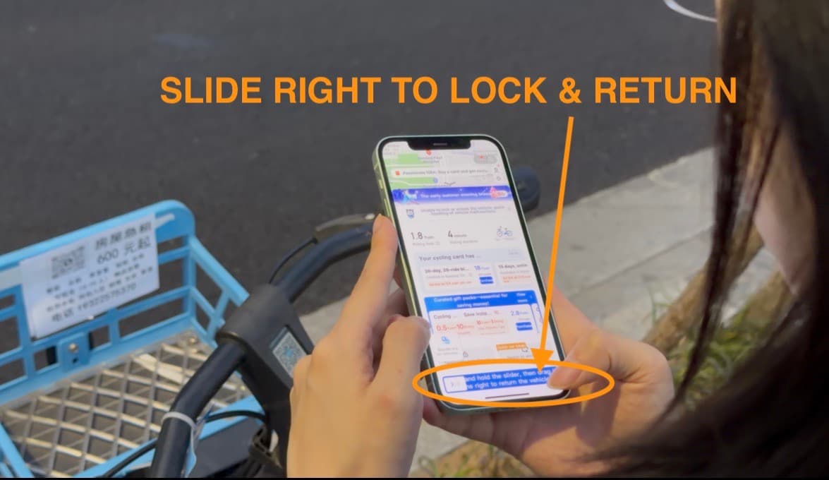 Alipay shared bike page showing slide right to lock and return