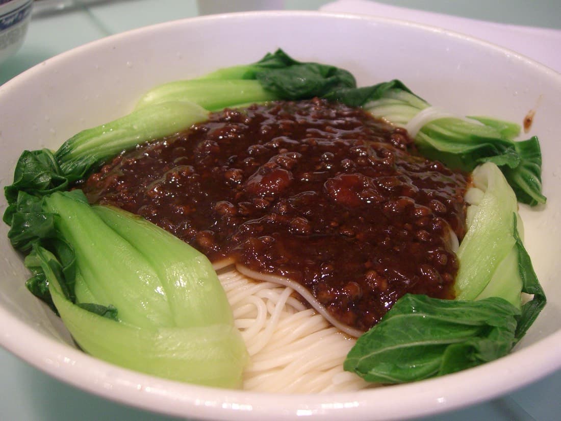 A bowl of zhajiangmian is an easy solo lunch, especially on a hutong sightseeing day.