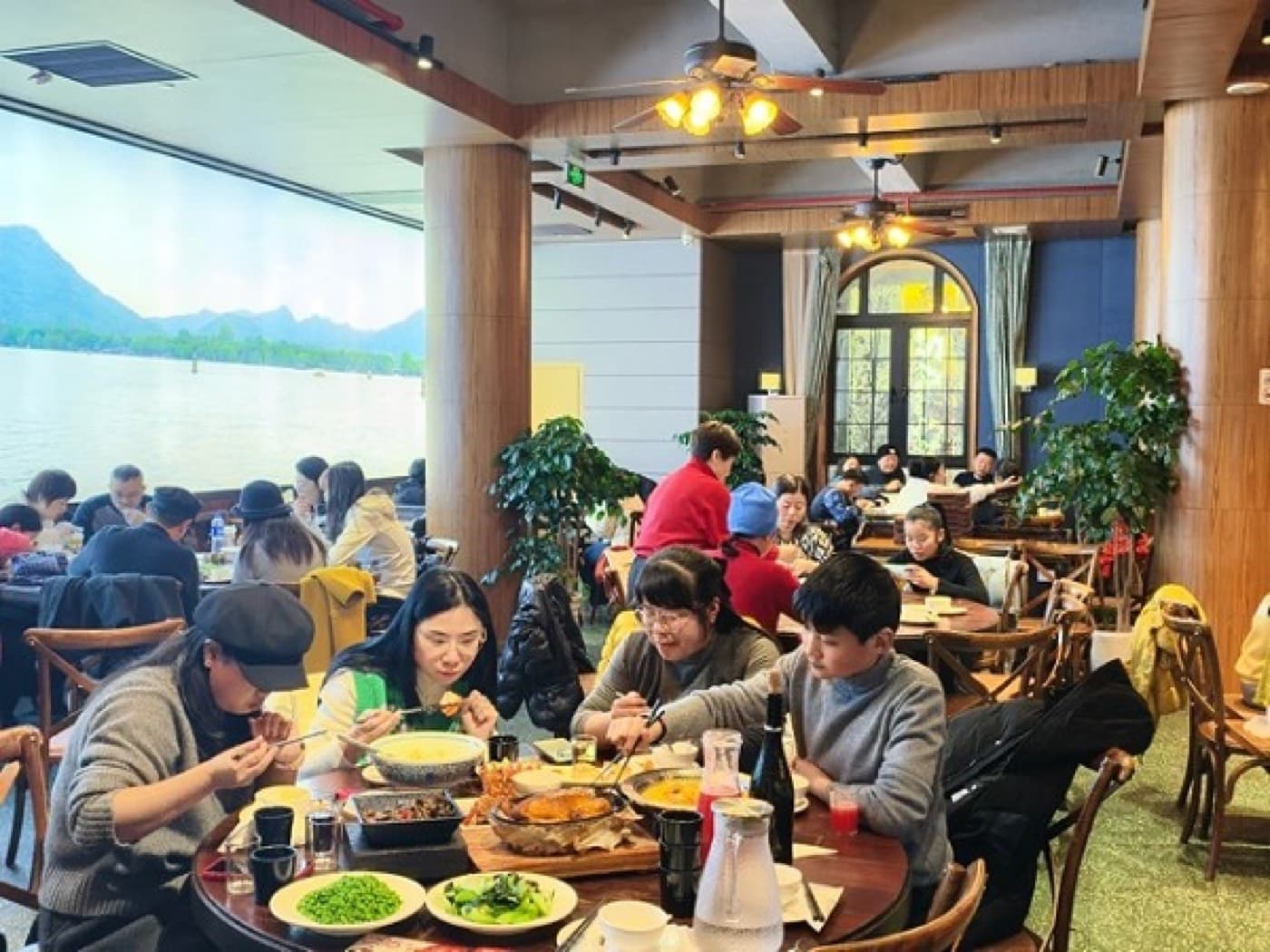 During major holidays, classic Hangzhou restaurants can become queue events as much as dining rooms.