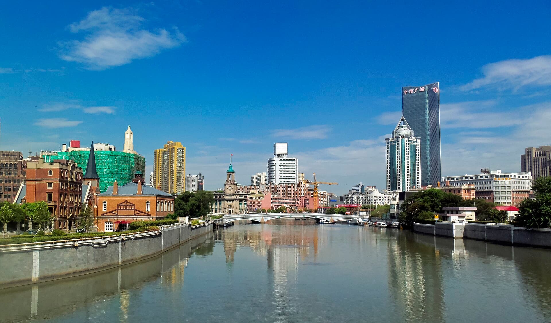 Suzhou Creek walks show a softer but more layered Shanghai: water, bridges, older buildings, and redevelopment.