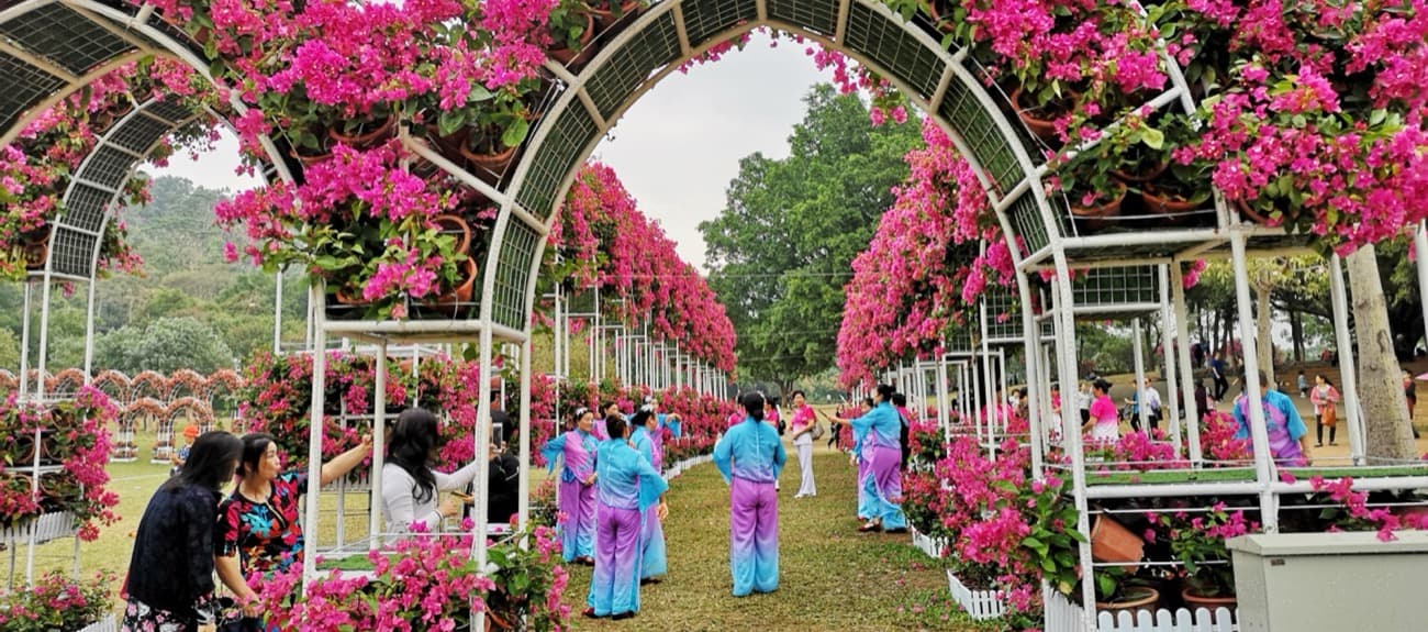 Flower displays and lawns add color to what could otherwise be only a skyline visit.