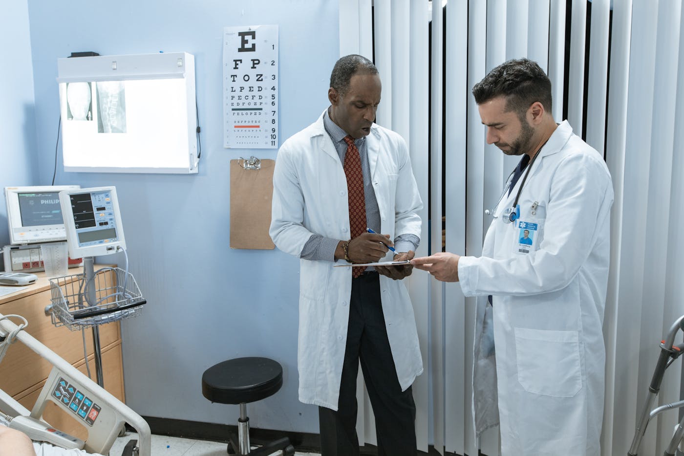 Doctors reviewing medical results and records