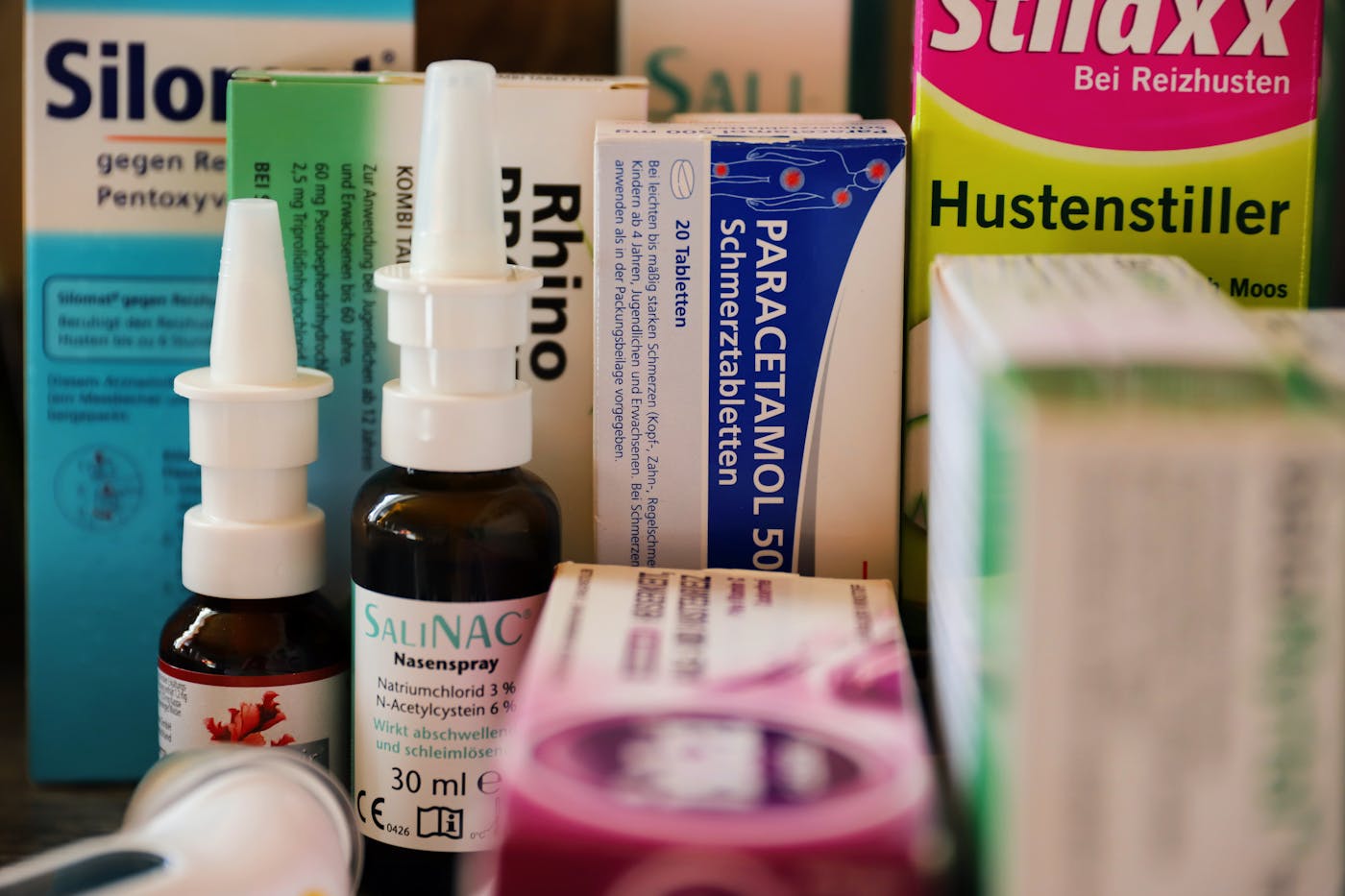 Medicine boxes on a pharmacy counter